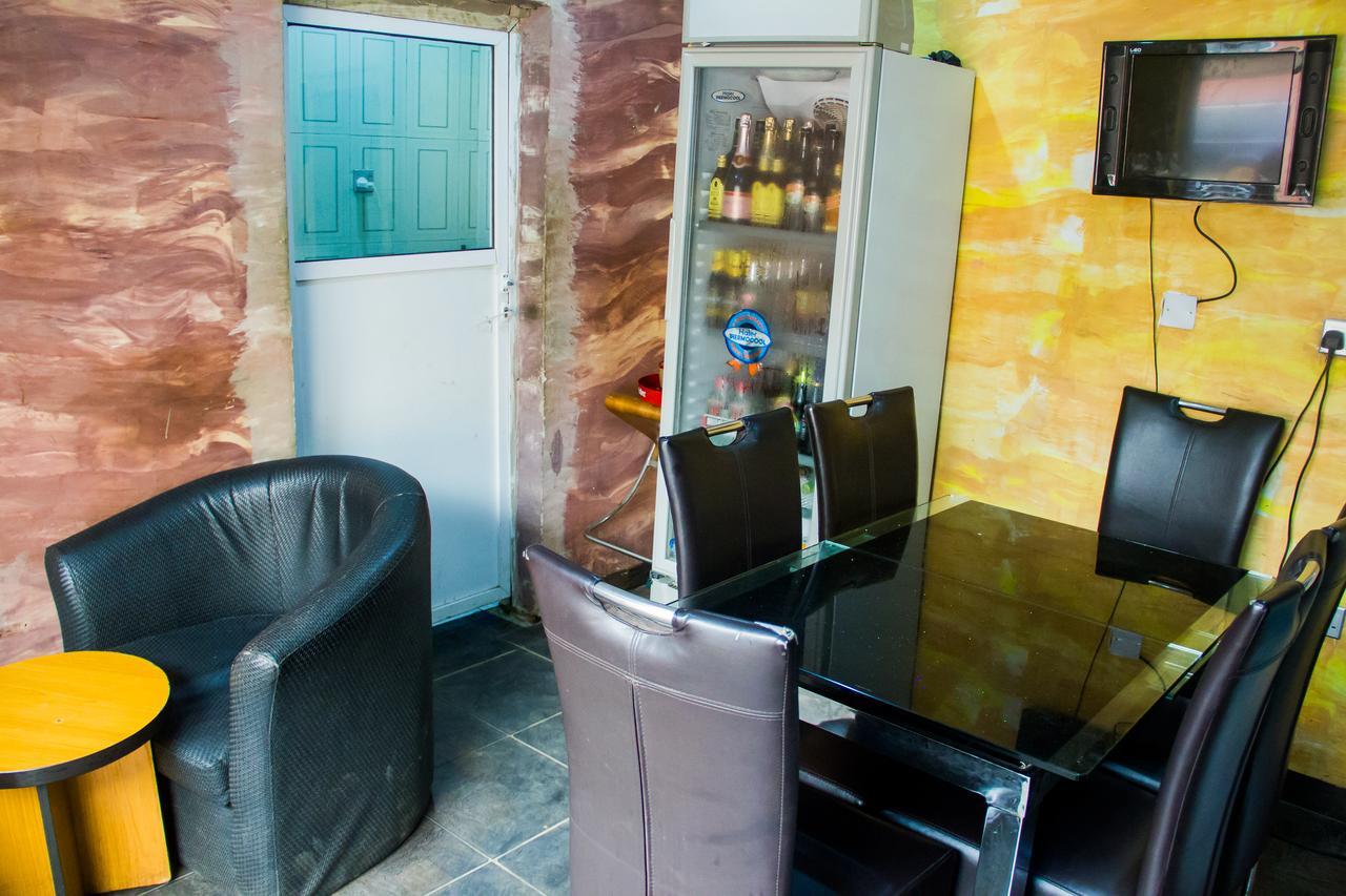 Glasshouse Hotel And Suites Egba Bagian luar foto